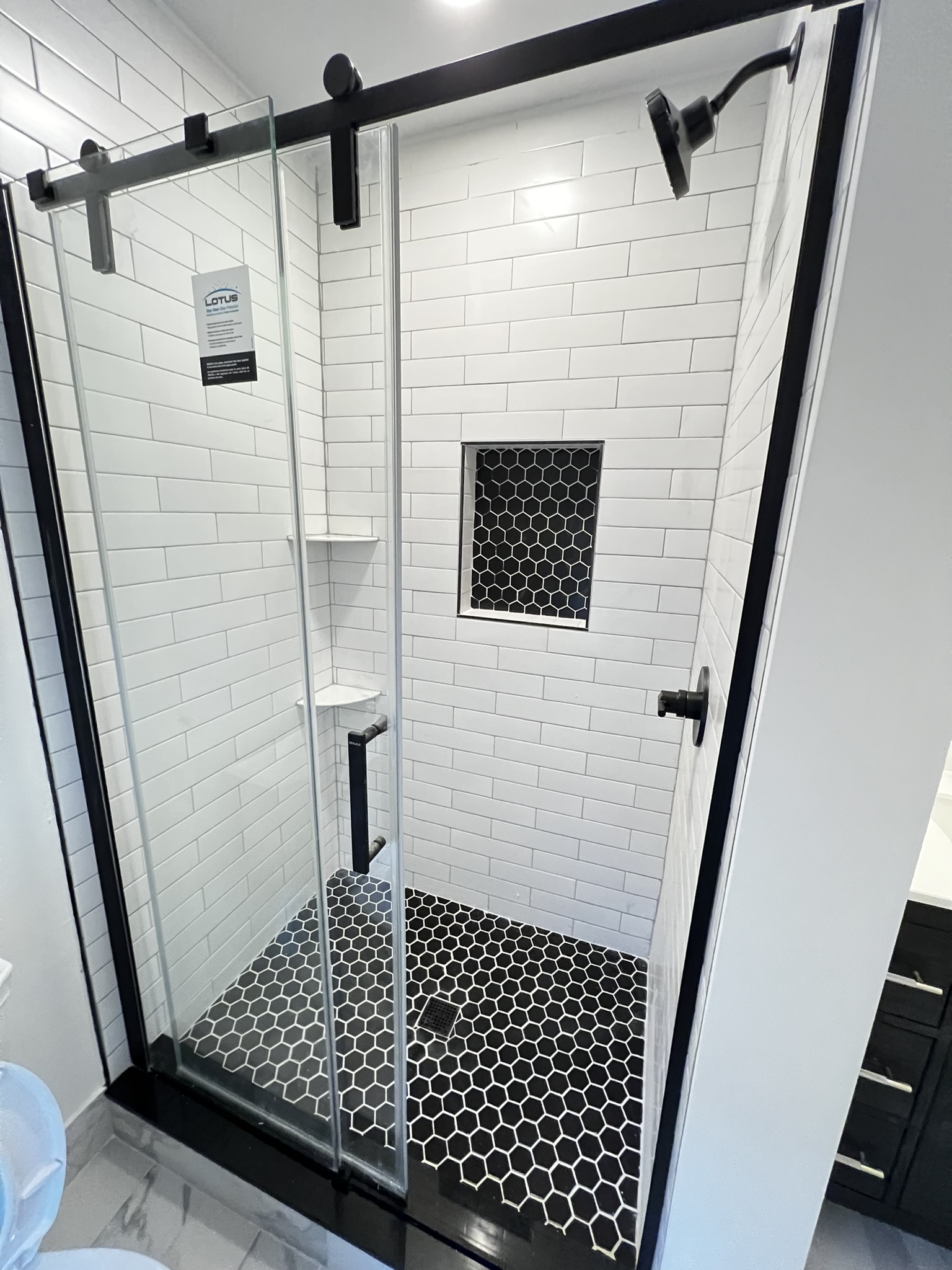 Bathroom fixtures and lighting updates completed by KesRemodel for a real client remodel