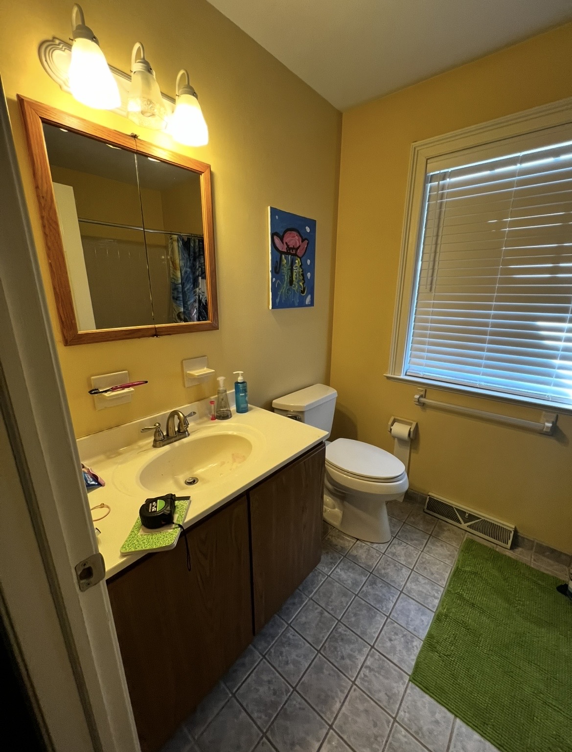 Bathroom renovation progress photo from KesRemodel showing vanity tile or fixture work in process