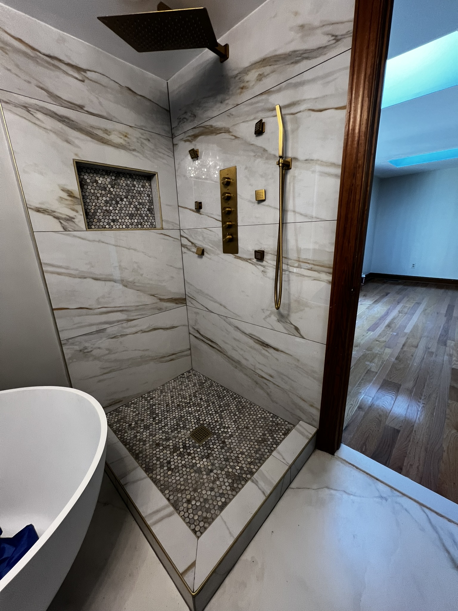 Walk-in shower remodel completed by KesRemodel for a real bathroom remodeling client
