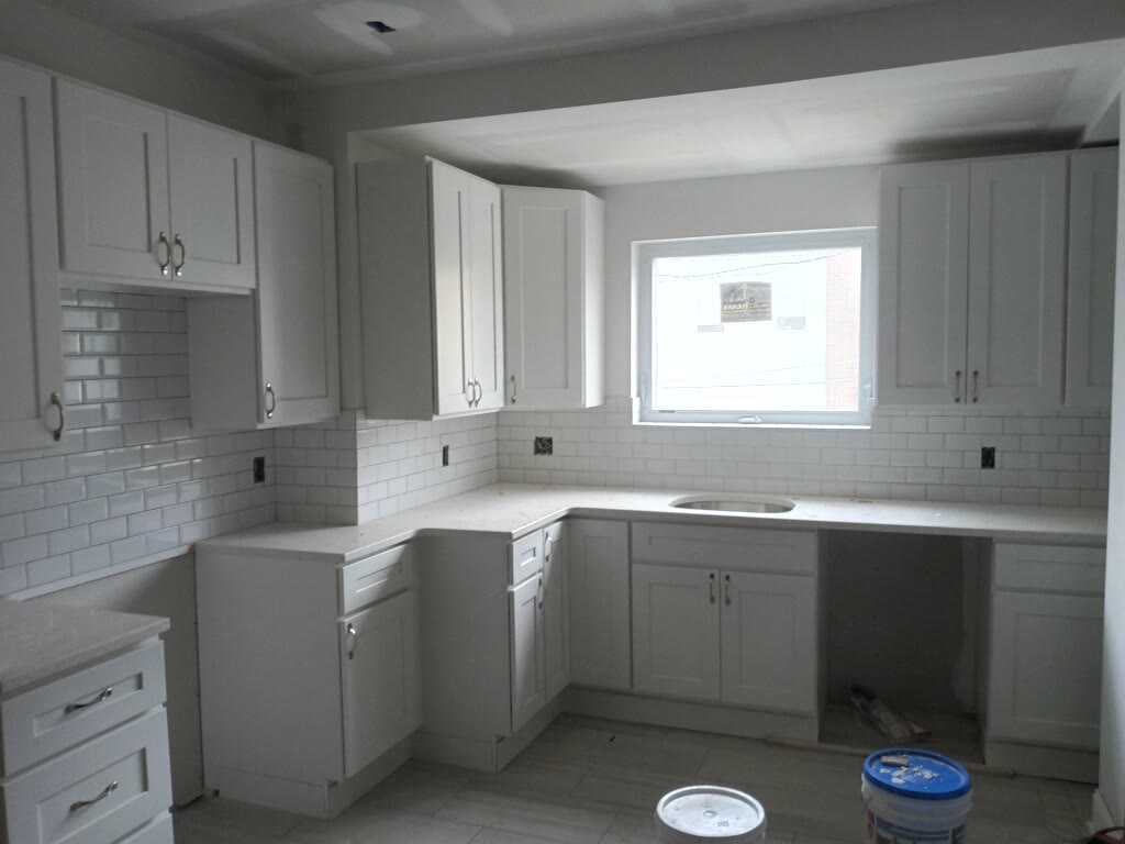 Kitchen backsplash fixtures and finish detail improvements