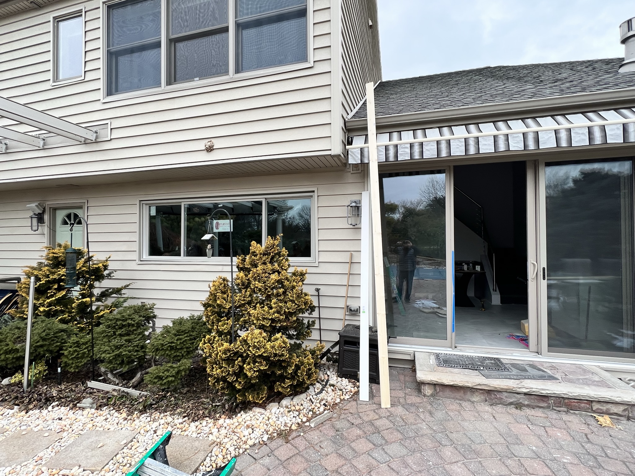 Exterior paver patio door area completed by KesRemodel