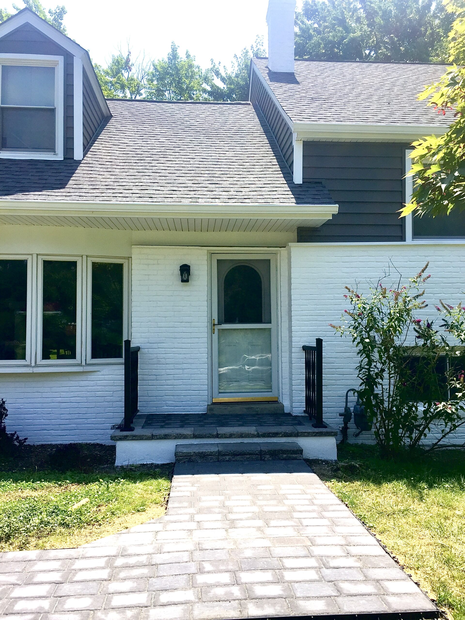 Finished paver walkway masonry and stucco service project by Keystone Exterior Solutions