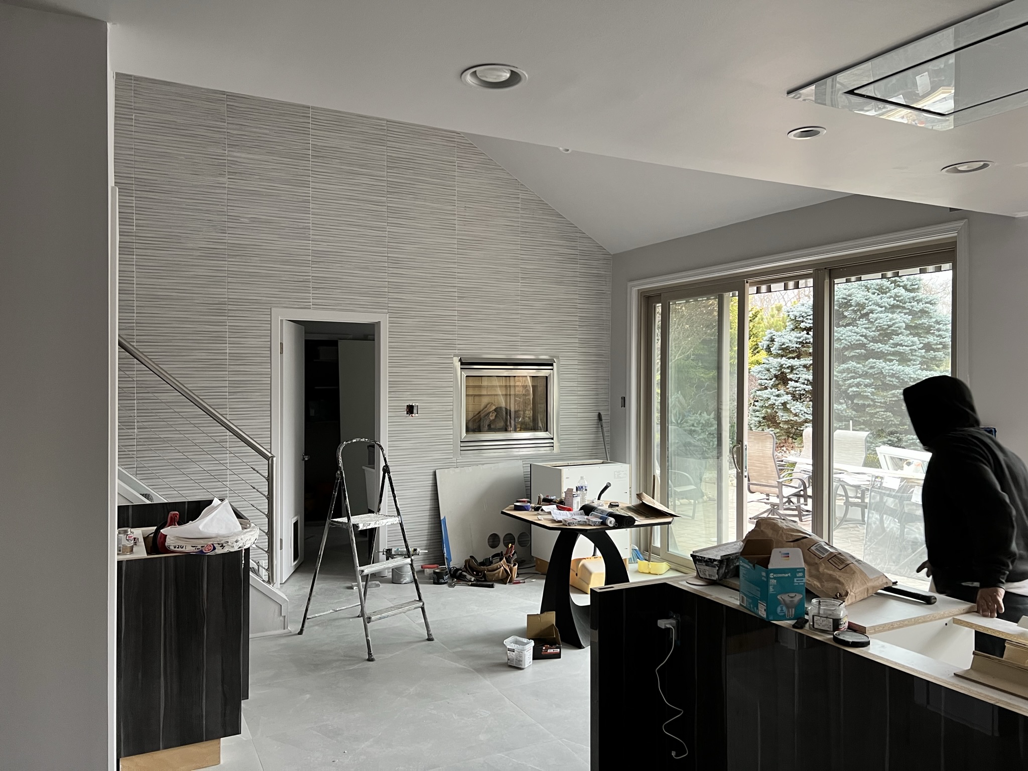 Finished interior stone wall masonry project completed by KesRemodel for a real client