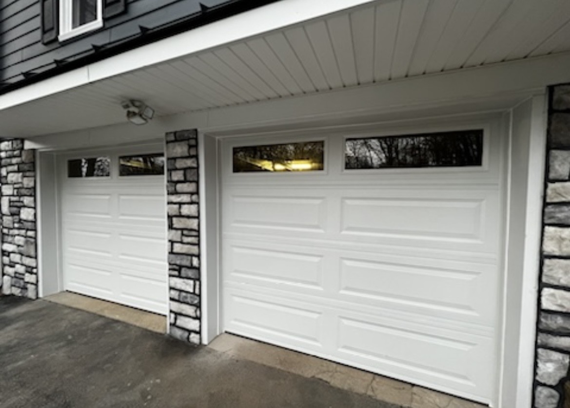 Stone veneer masonry facade work completed by KesRemodel on a real client home